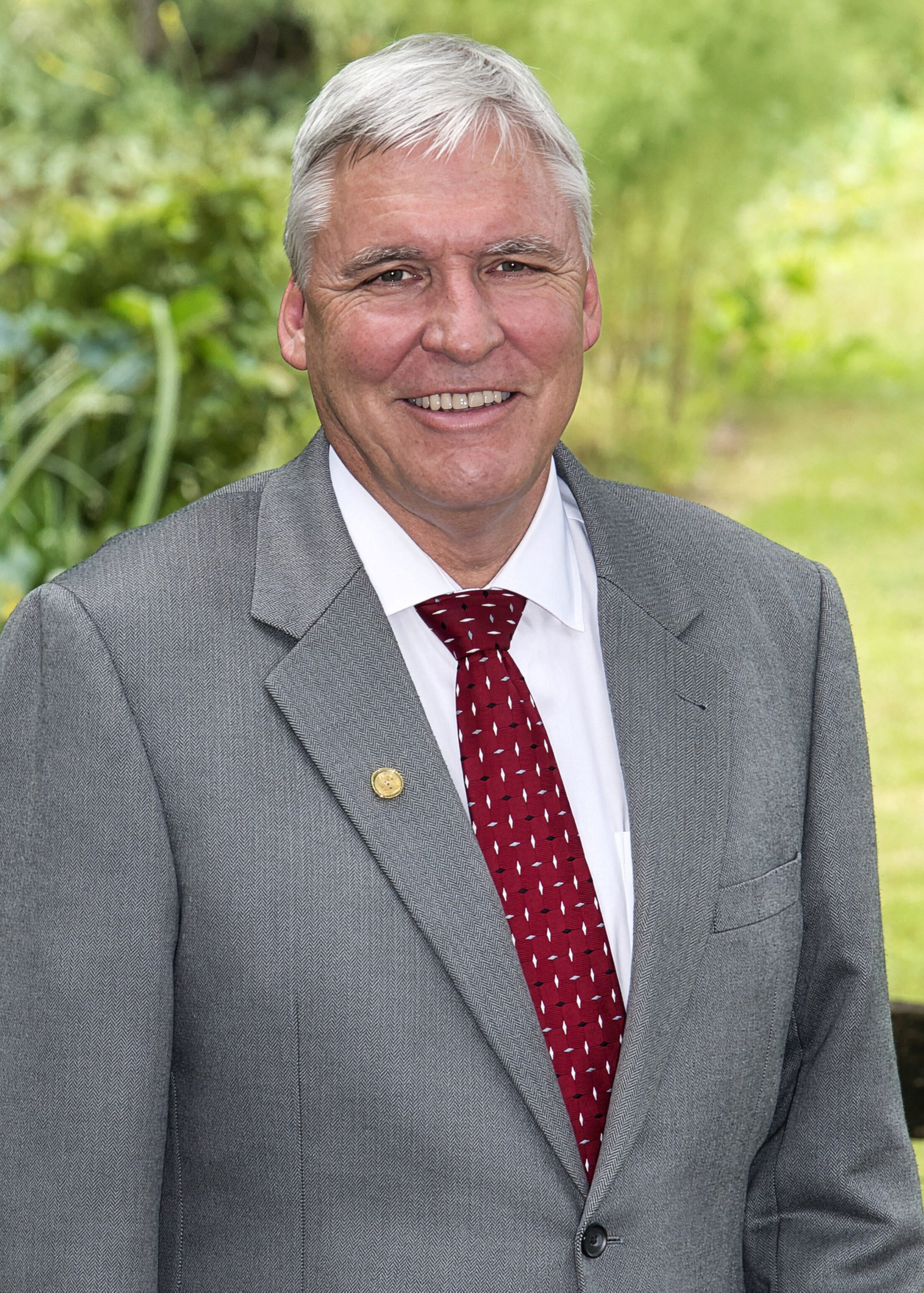 Portrait of a man outside in a natural setting