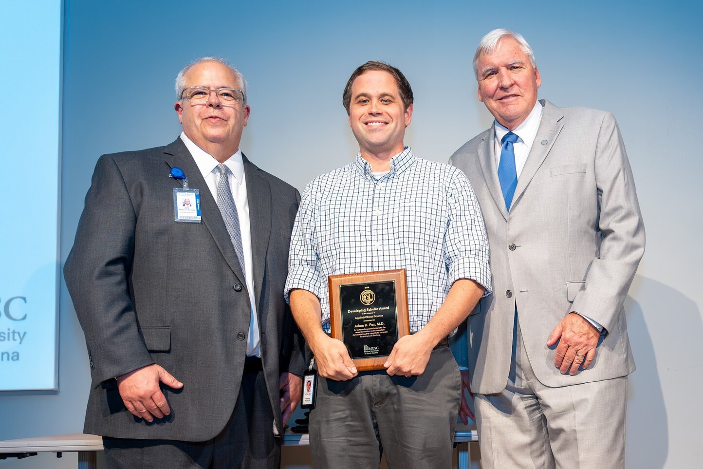 Dr. Fox receiving his award.