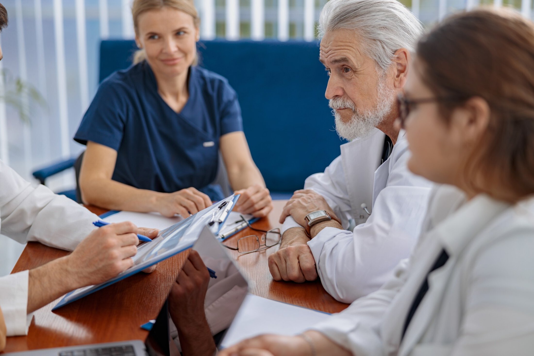 Successful medical doctors are discussing diagnosis during the conference
