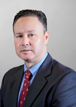 Tom Nesteruk wearing a suit