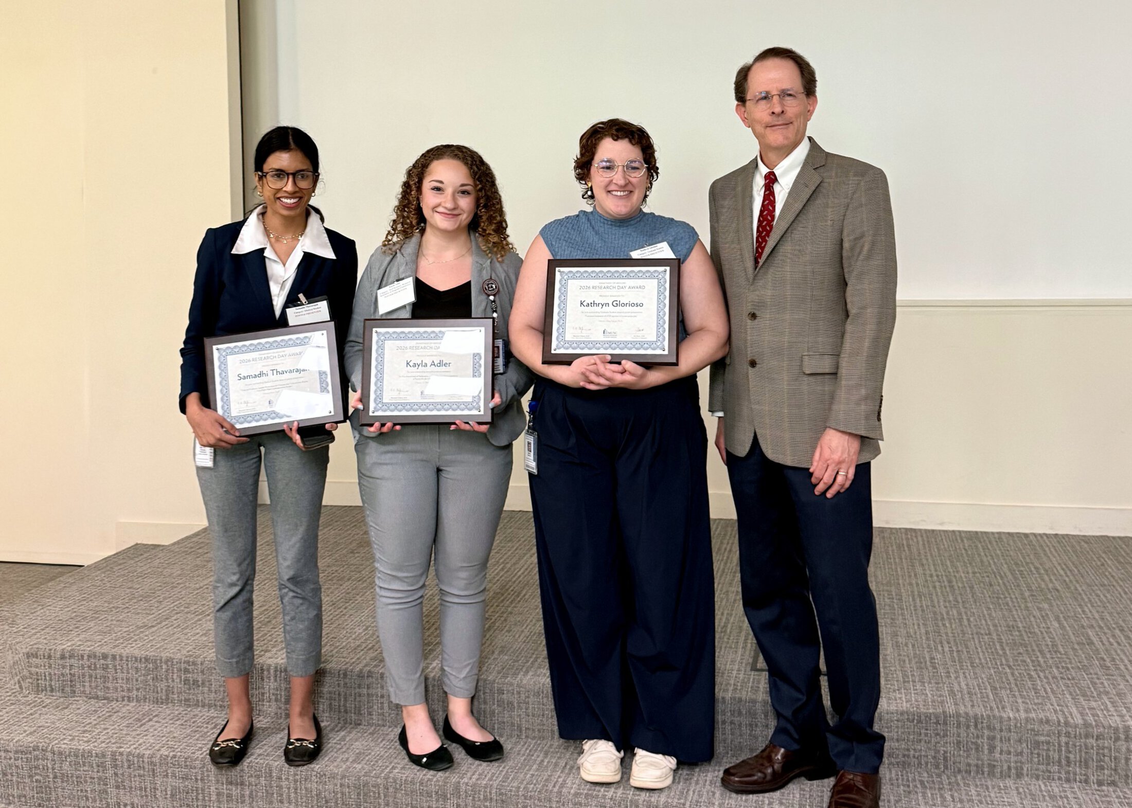 Department of Medicine Research Symposium Poster Award Winners from right to left: Samadhi Thavarajah, Kayla Adler, Kathryn Glorioso, with James Oates, MD, VC of Research in the Department of Medicine.