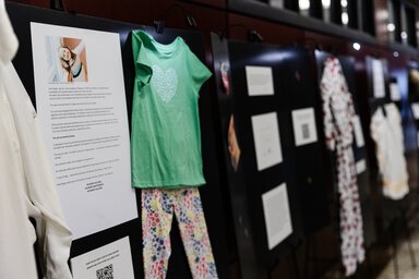 Clothes pinned on poster