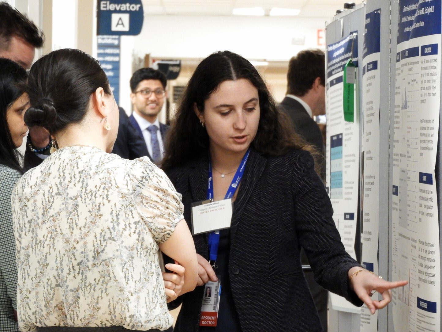 Izabela Abissi, D.O., presenting her poster during the annual Department of Medicine's Research Symposium