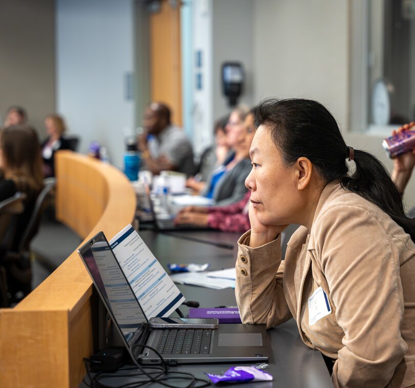 Faculty member watching a keynote at MUSC's CATL Spring Educational conference in 2026