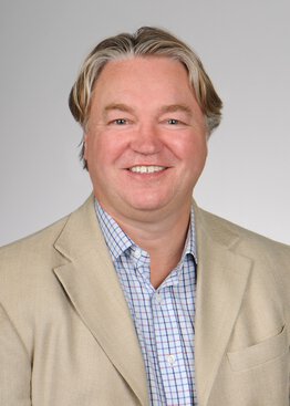 Stephen Duncan, Regenerative Medicine, PhD, Professor wearing a tan jacket and dress shirt