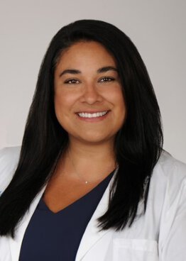 Elizabeth Diaz, Peds wearing a white coat