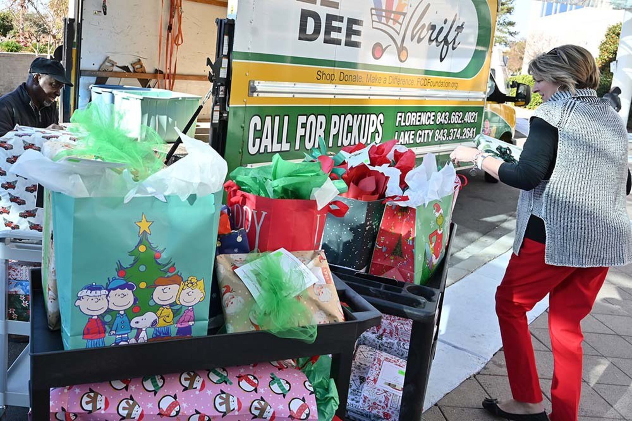 Florence Angel Tree gift donation drive truck loading up presents