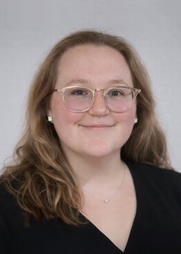 Aubree Johnson, MPH STAR (Stroke Thrombectomy & Aneurysm Registry) Program Coordinator wearing a black shirt