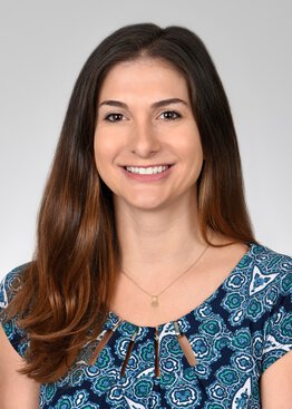 Emily Gottfried, Medicine, PhD, Associate Professor wearing a blue dress