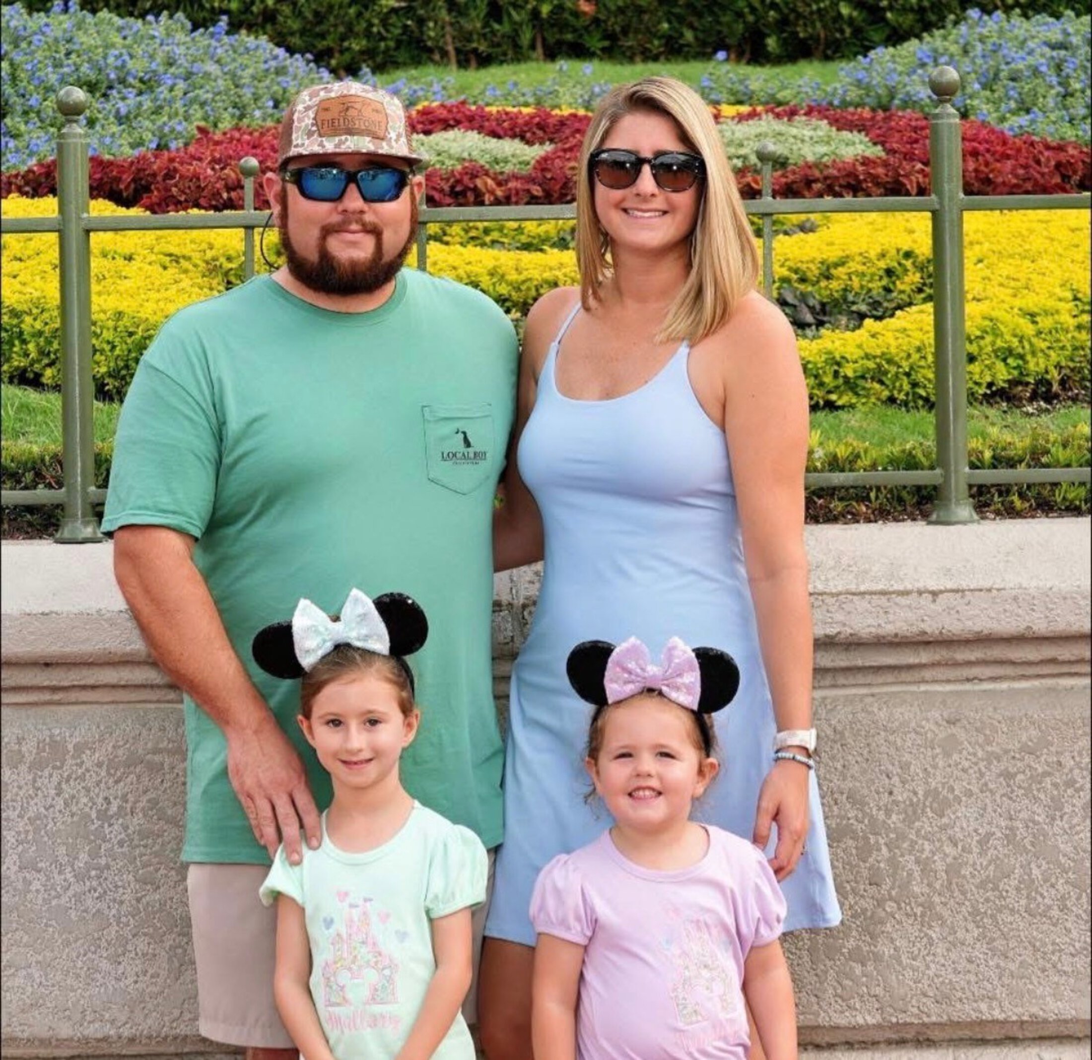 Patient family outside with children at Disney World