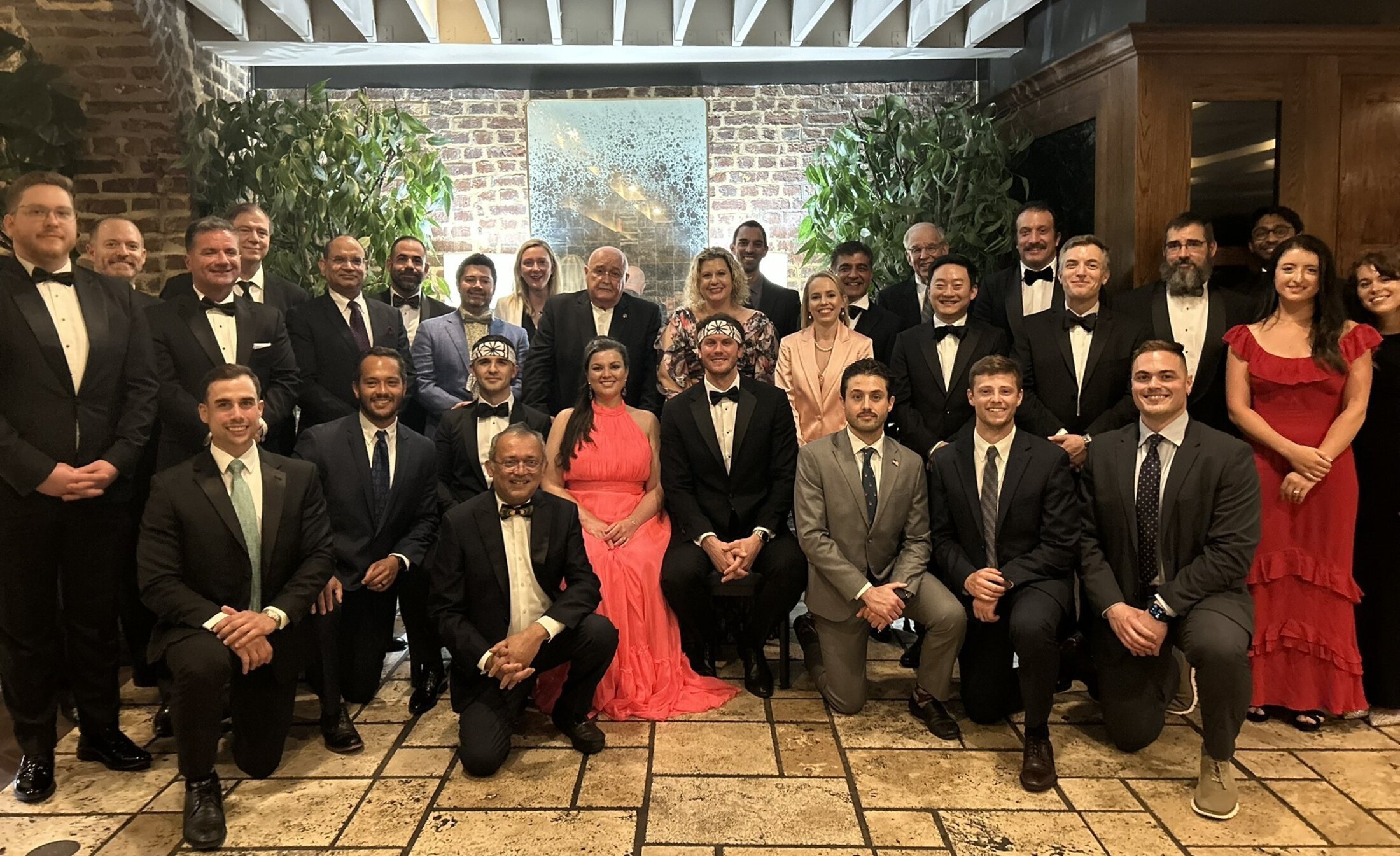 College of Medicine resident and faculty group photo taken at a dress event
