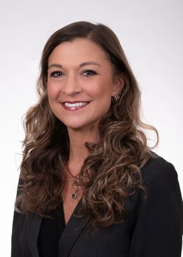 Shannon Phillips wearing a dress suit