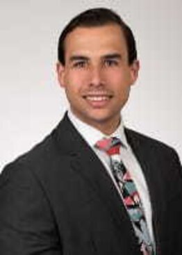 Ricardo Domingo Cabreja, fellow wearing a blazer