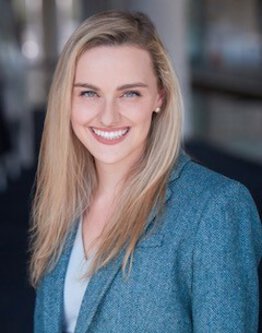 Justine McKittrick, M.D. Emergency Medicine Developing Teacher wearing a sport coat