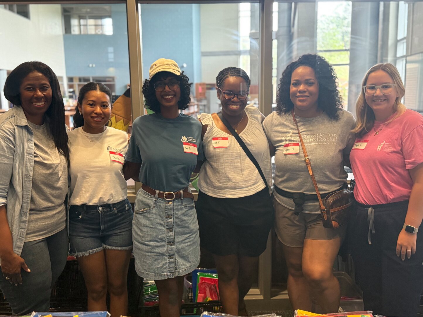 Residents and PRIME staff volunteering at local elementary school.