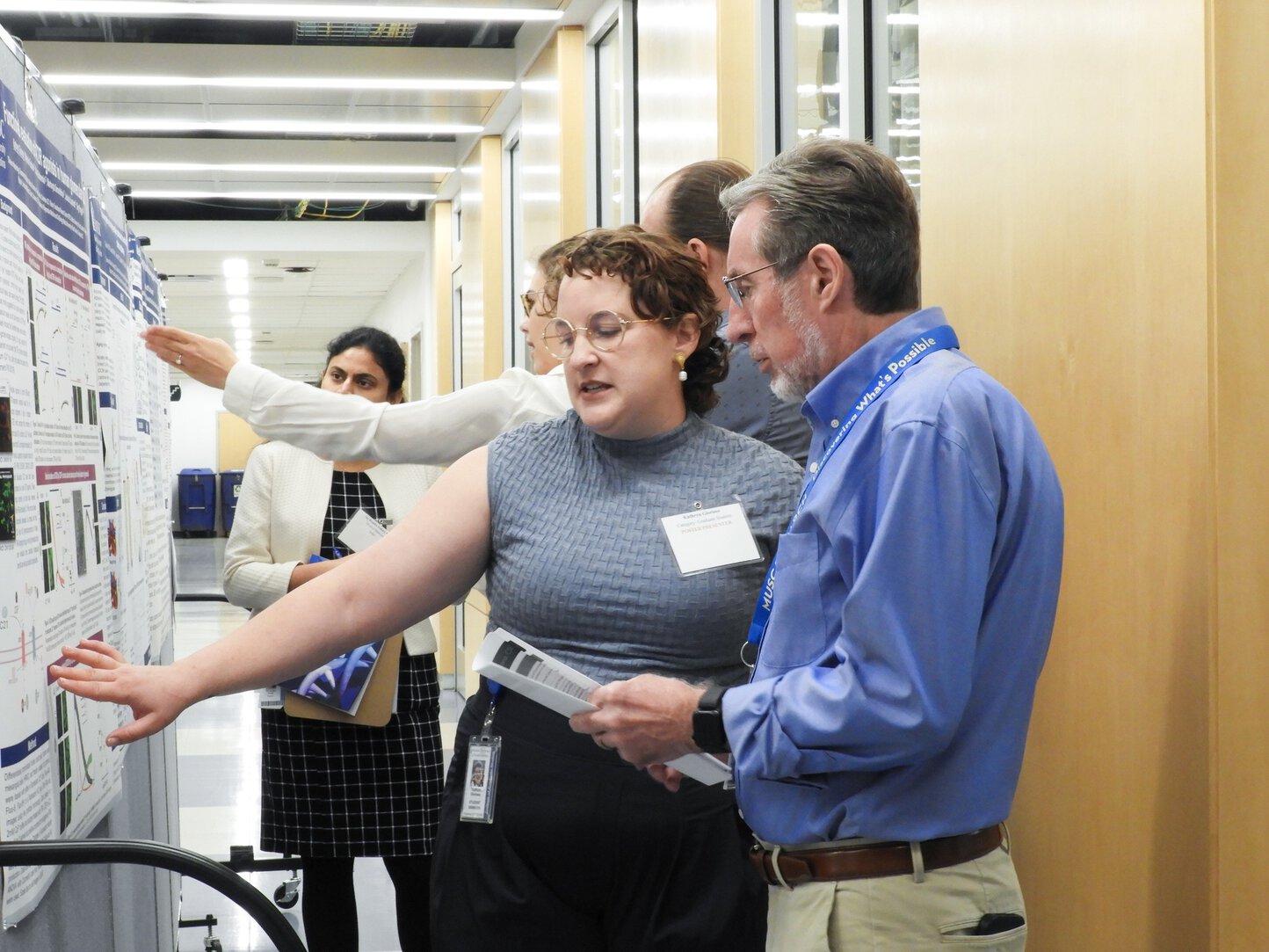 Kate Glorioso presenting her research during the Department of Medicine Research Symposium poster session.