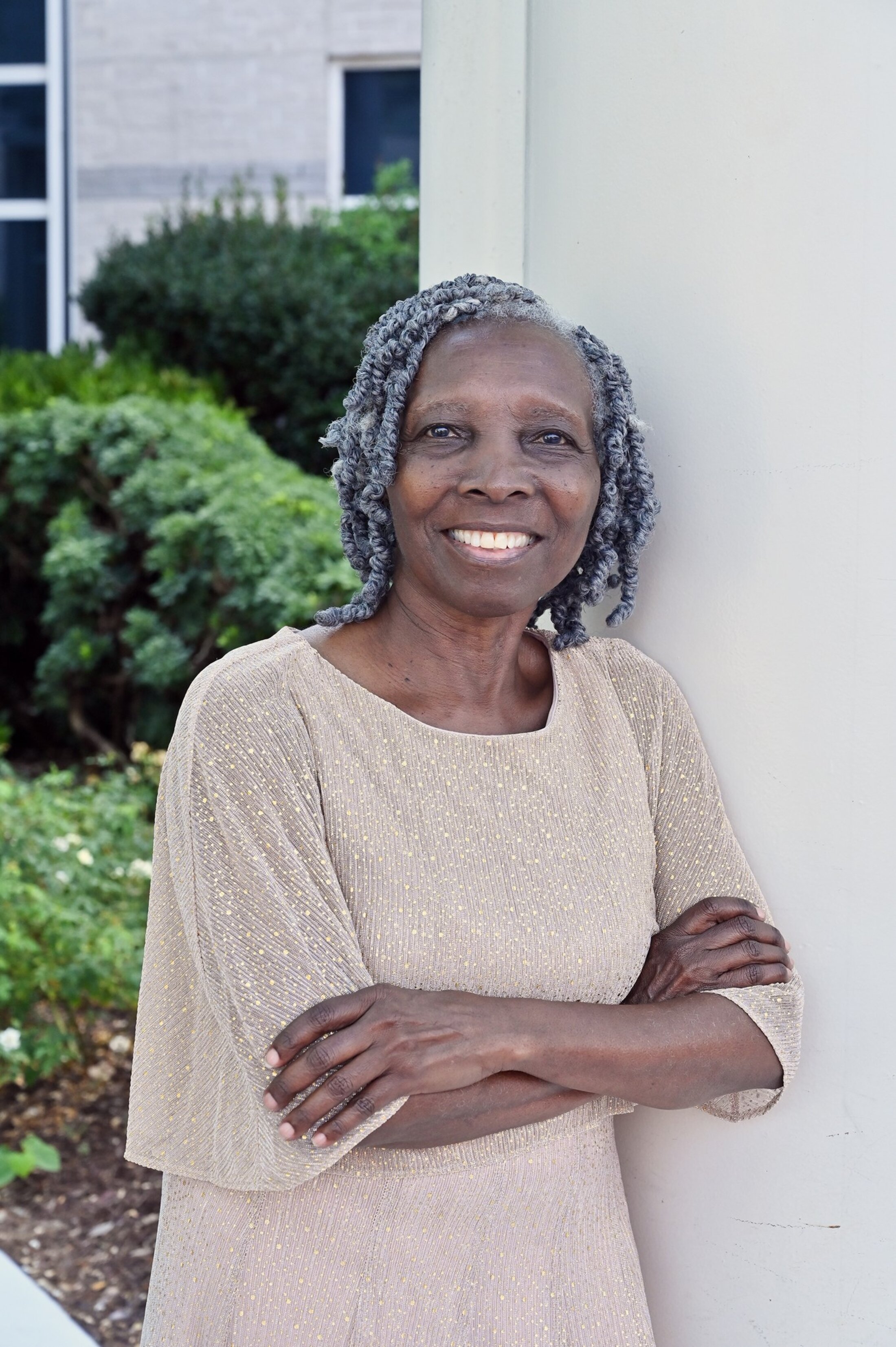 Portrait of a relaxed and smiling Debra Chandler.