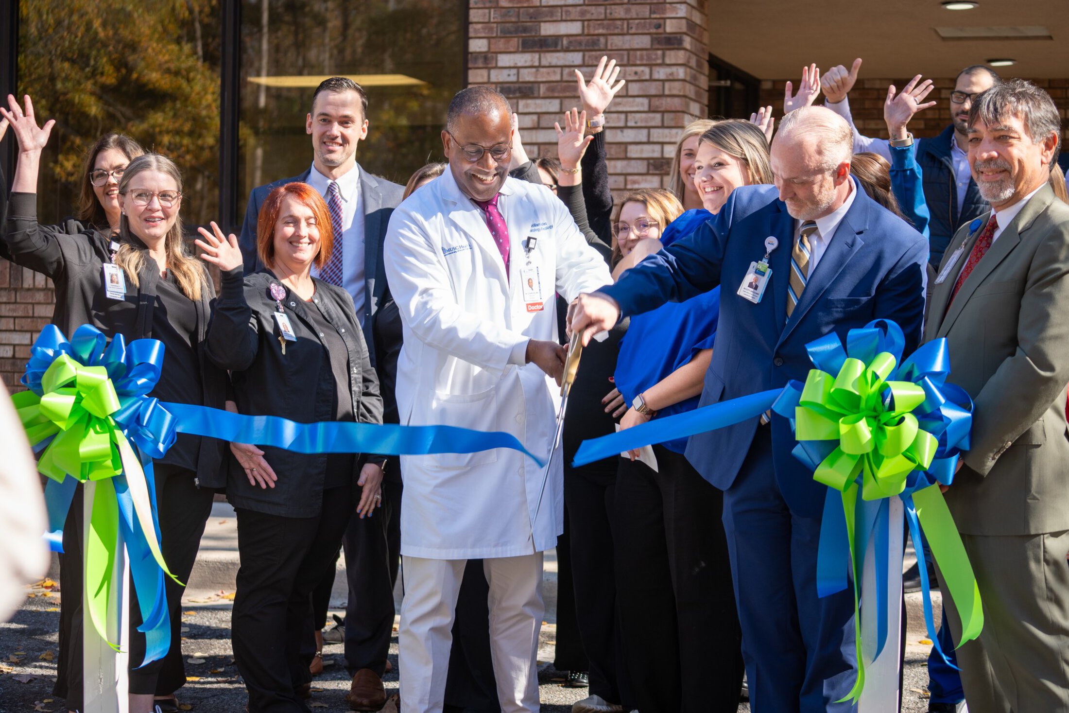 MUSC Health Lancaster Hematology and Oncology Ribbon Cutting with group outside