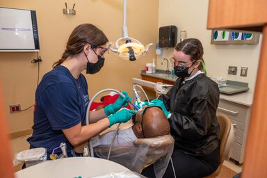 Patient Andre Singleton been helped by dental staff
