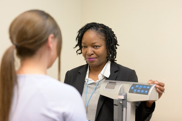 MUSC Health and Wellness Center patient and coach meeting at a weigh station