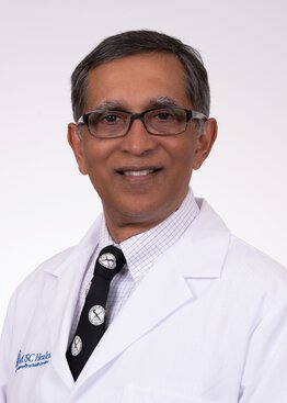 Prabhakar Baliga, MD, Transplant Surgery, wearing a white coat