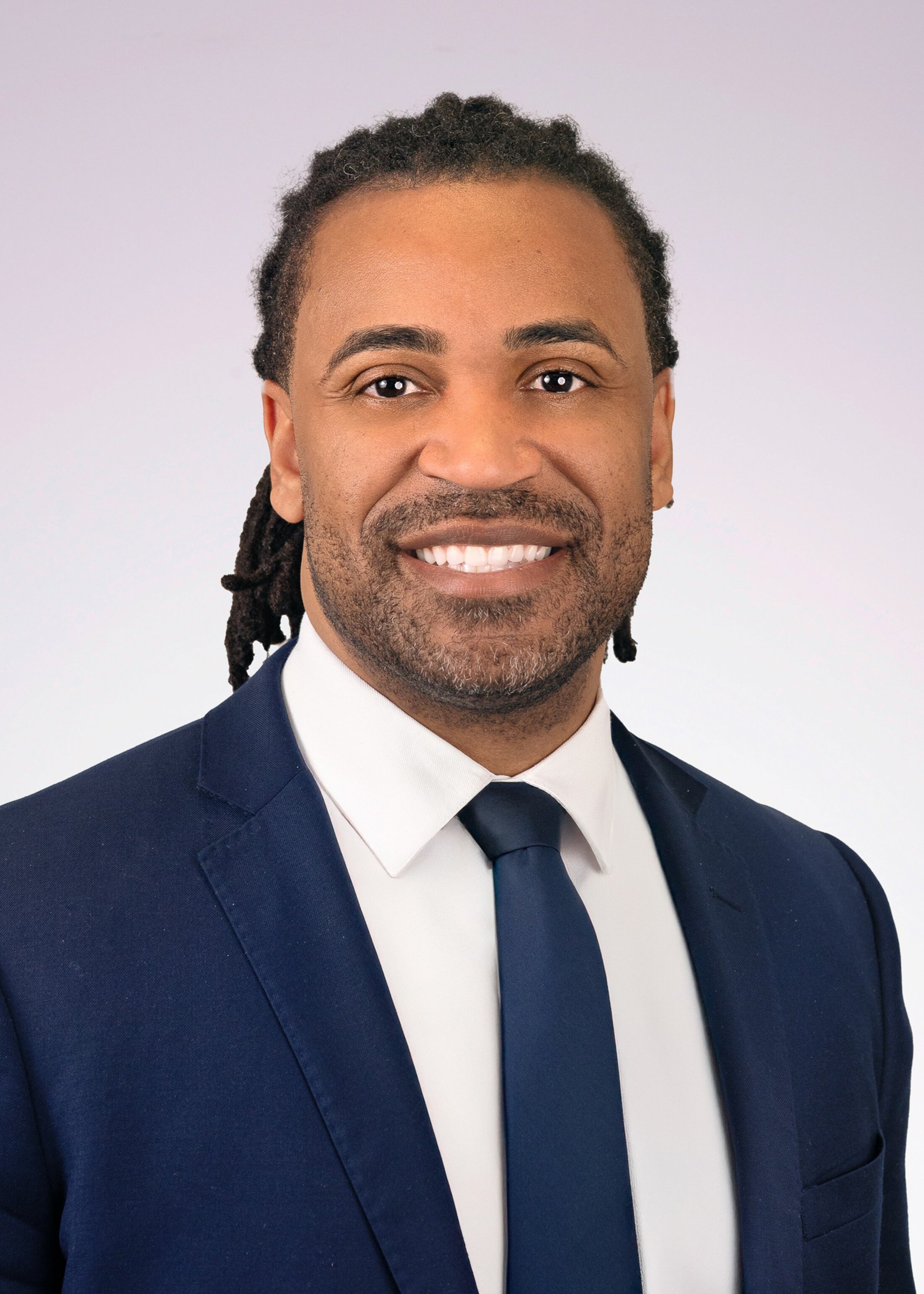 photo of a man in a suit, Matthew Medley, MHA