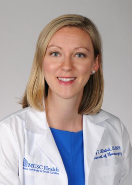 Kimberly Kicielinski, MD, MSPH, Neurosurgery wearing a white coat