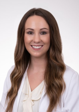 Brittany Stolz - Neuro CC - NSICU wearing a white coat