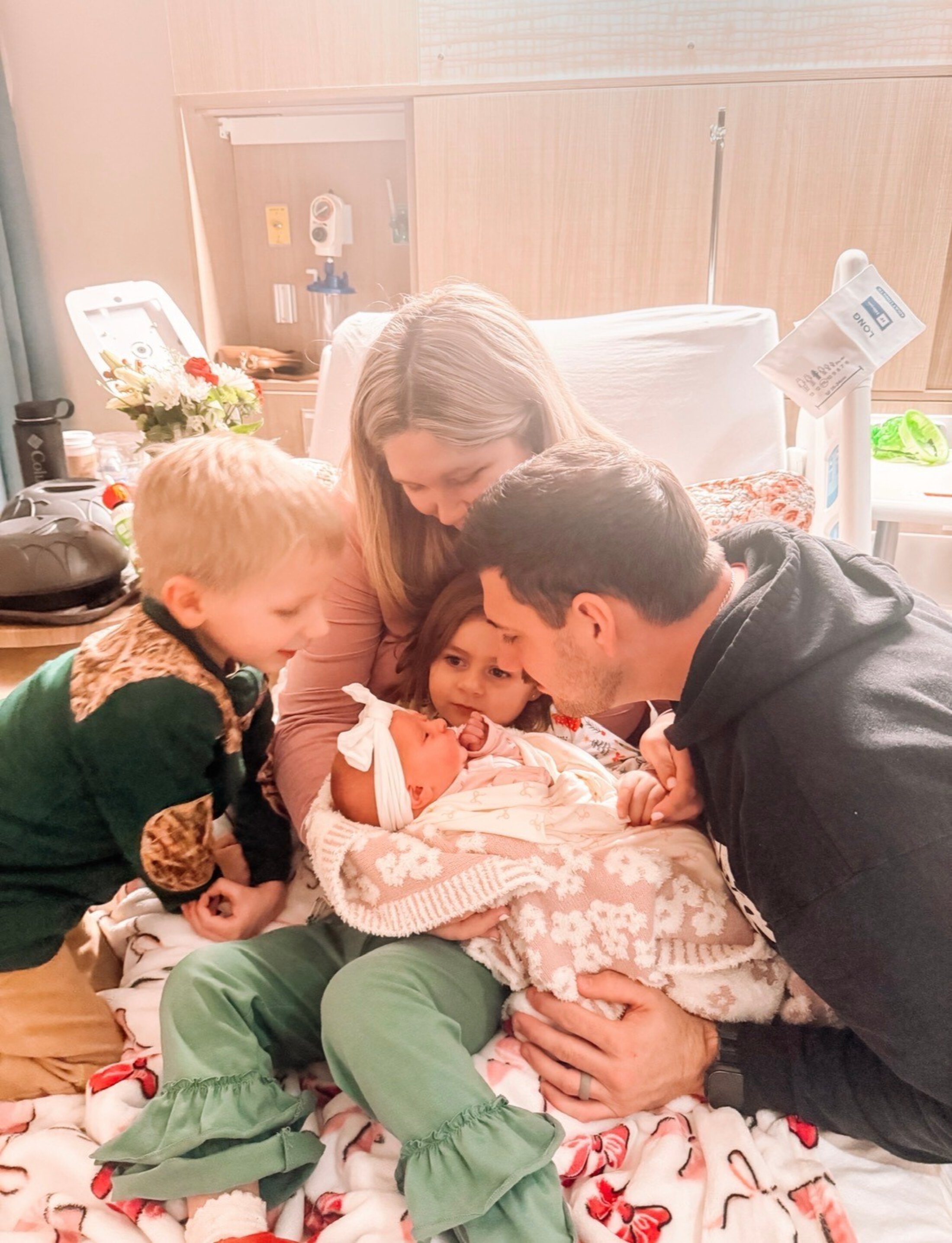 After cancer, Luke experienced a typical childhood milestone - meeting his new baby sister in the hospital.