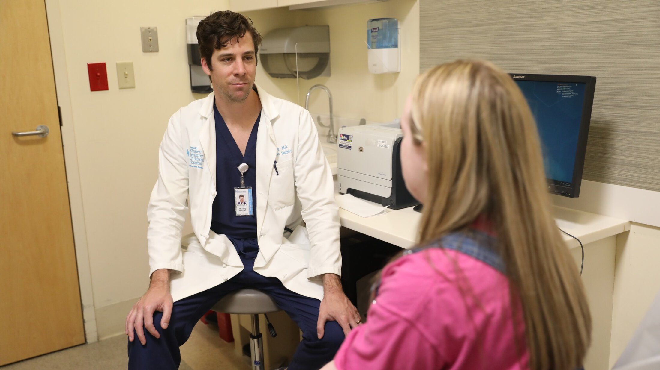 Female patient at MUSC Health checking heart rate