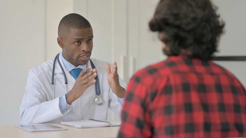 African Doctor Talking with Patient, Treatment