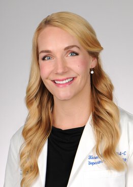 Karen Karpick Anderson, GI wearing a white coat