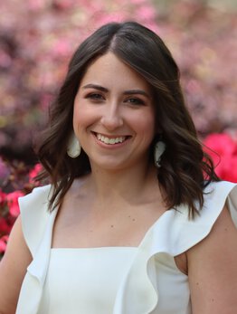 Jordan Jarvis wearing a white dress