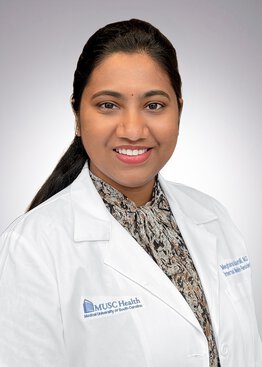 Sri Lakshmi Sai Meghana Adusumilli, Allergy and Immunology, MD wearing a white coat