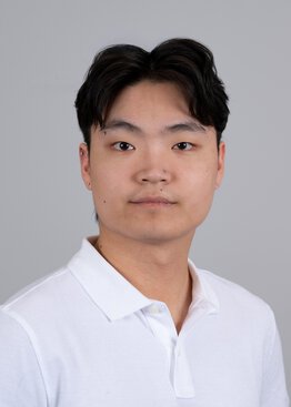 Jack Stoops Psychiatry wearing a white polo shirt