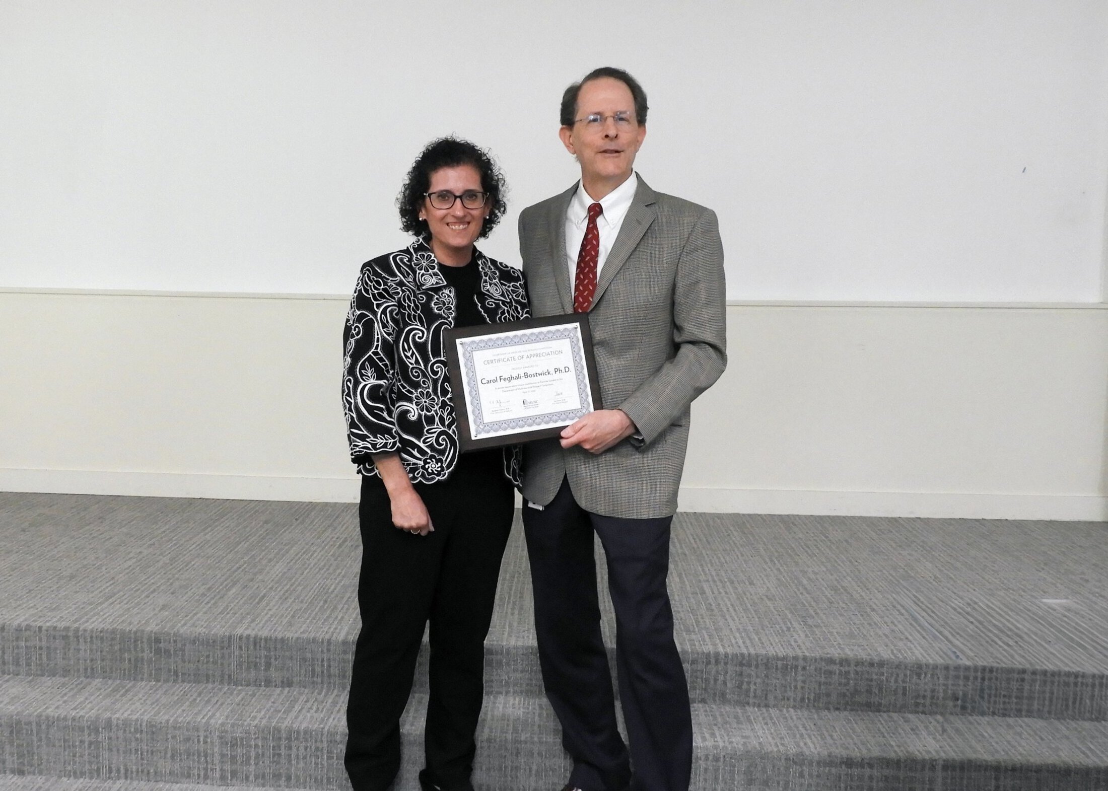 Carol Feghali-Bostwick, Ph.D., Distinguished University Professor SmartState and Kitty Trask Holt Endowed Chair for Scleroderma Research, Department of Medicine, with Jim Oates, M.D., Vice Chair for Research, Department of Medicine, MUSC