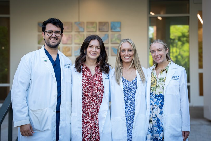 Chief Residents standing in front of building