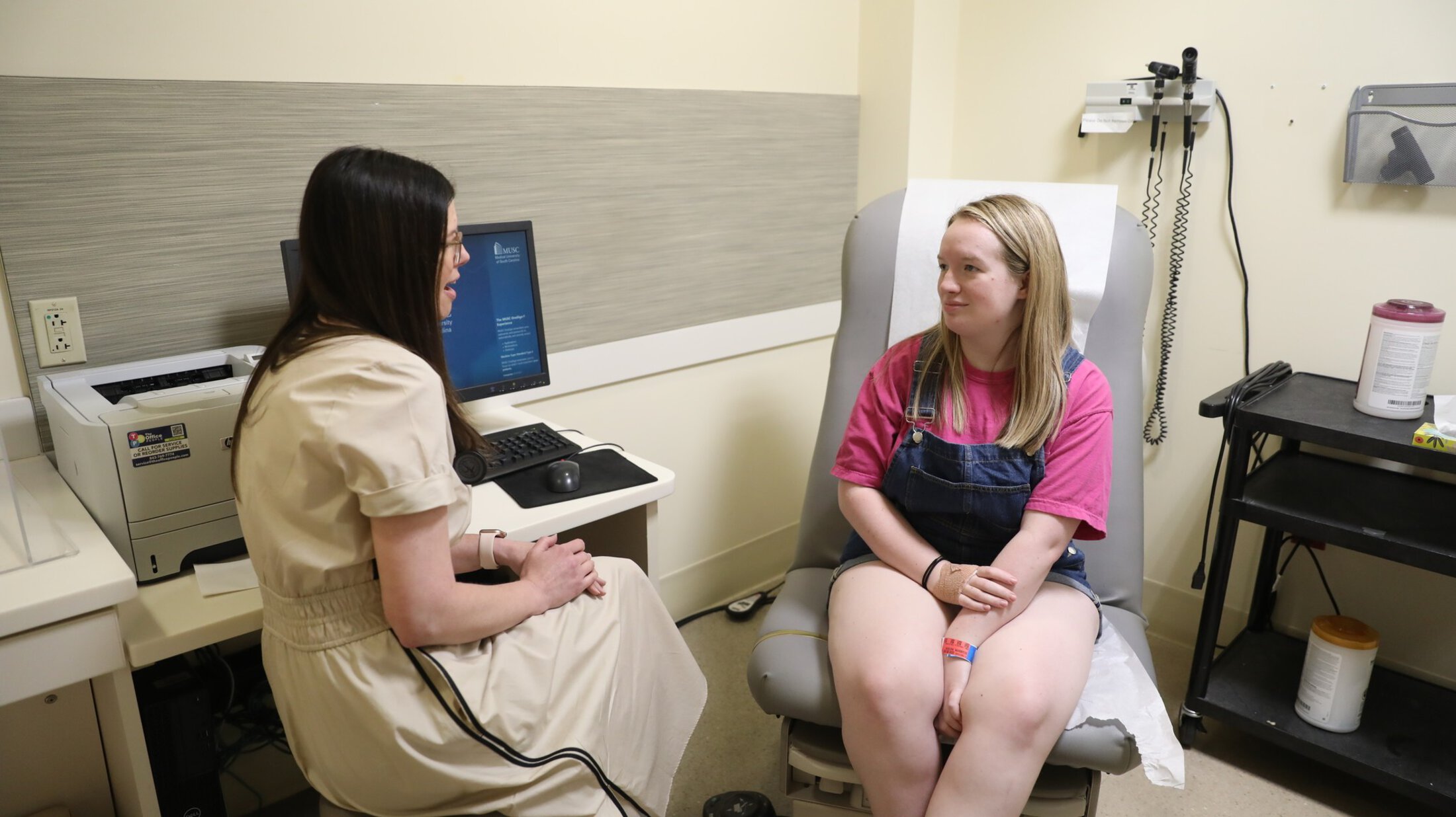 Female patient at MUSC Health checking heart rate