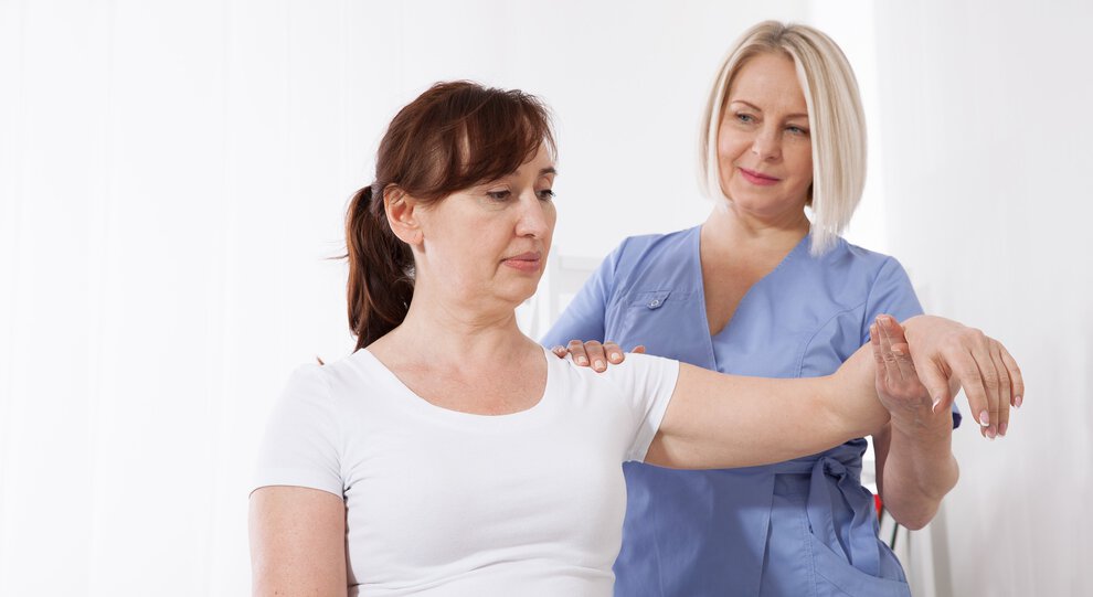 Warm and patient-centered — a provider in a compassionate consultation with a patient.