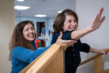 Woman on stairs with female provider DSC00296-Enhanced-NR-WEB