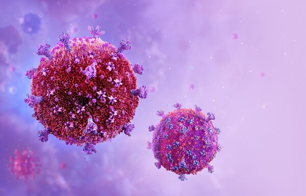 Two reddish pink balls on a lavendar background. The balls haev purple, pink and blue spikes coming out of them.