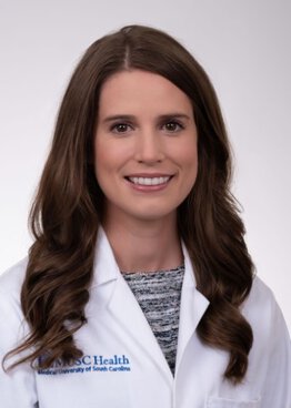 Margaret Ellen Baxley Critical Care wearing a white coat