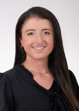 Liliana Ladner, M.D. wearing a black dress