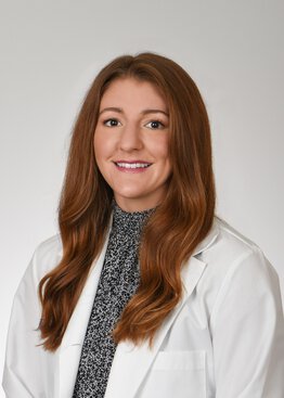 Ashton Getchell, PA, ENT - Head & Neck Cancer, Cancer - Head & Neck Tumors wearing a white coat