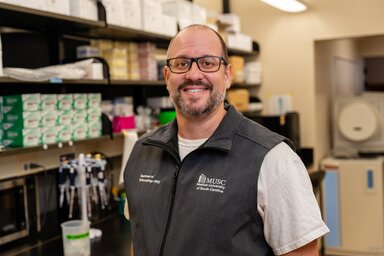 Portrait of Brent Wilkerson in his lab.
