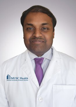 Abhishek Matta MD Critical Care Medicine wearing a white coat