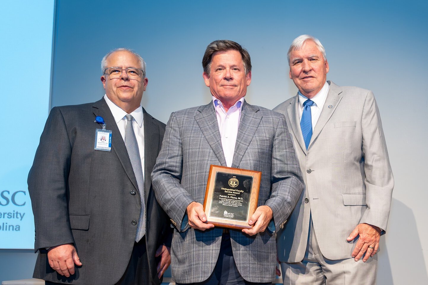 Dr. Patrick Flume accepting his award.