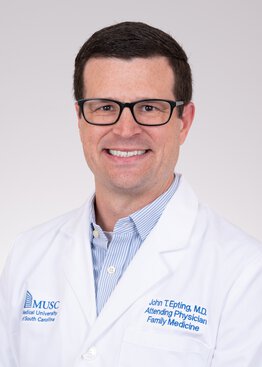 John Epting MD Family Medicine wearing a white coat