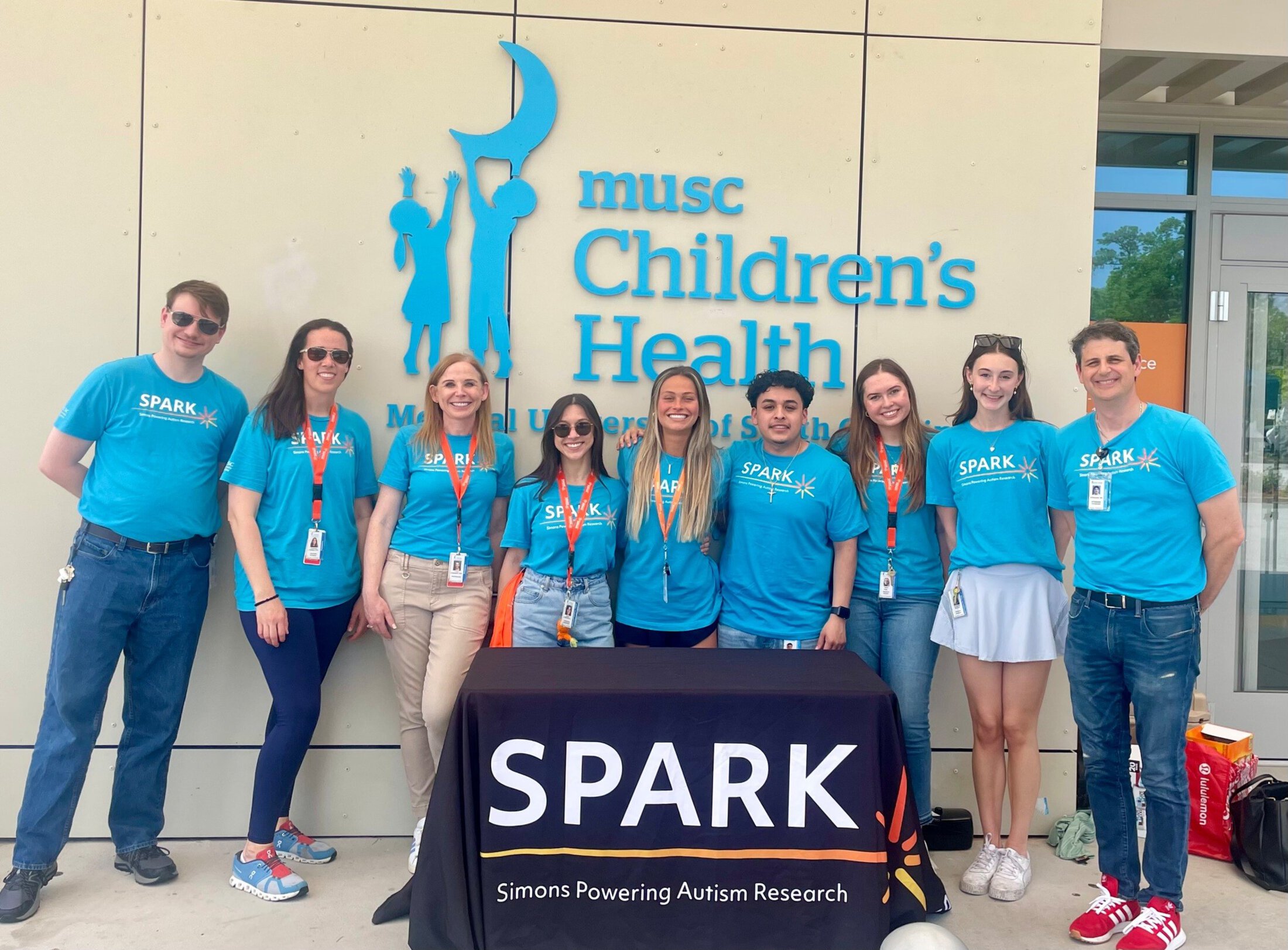 Photo of the MUSC SPARK team standing in front of the MUSC Summey Medical Pavilion