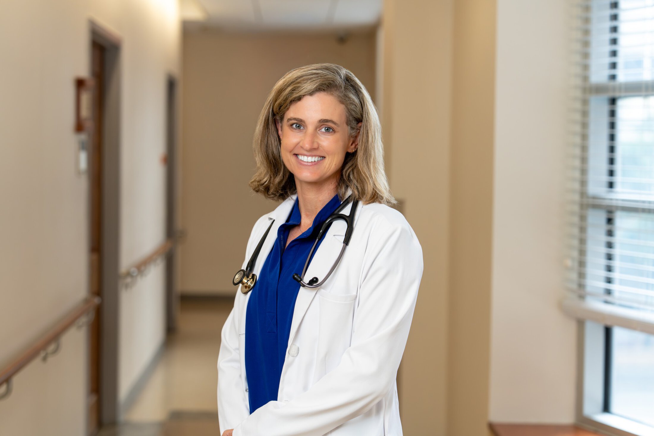 Portrait of Dr. Katherine Antel in the clinic hallway.